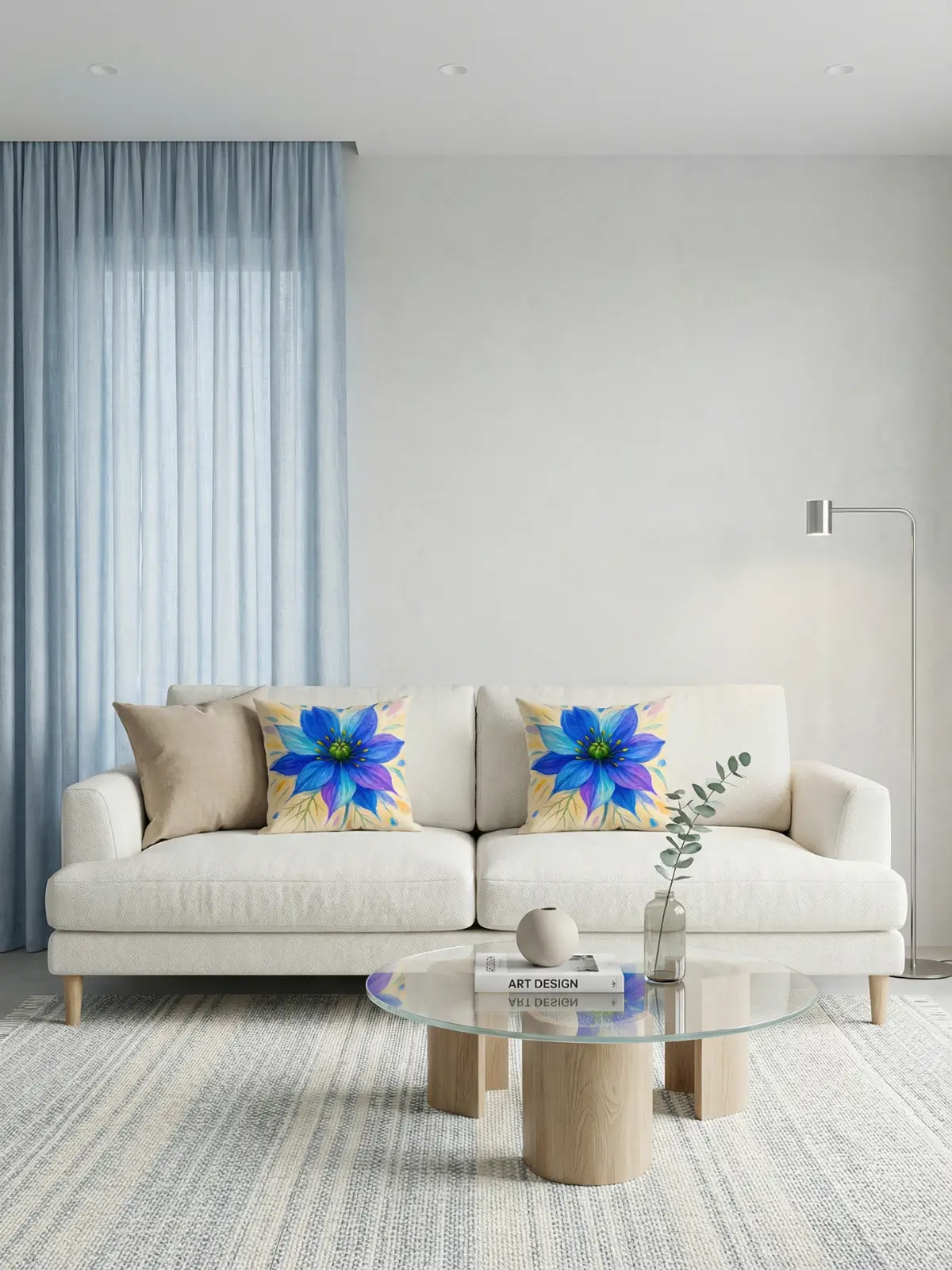 Modern art living room with light blue curtains, ivory sofa, and nigella abstract cream floral pillows
