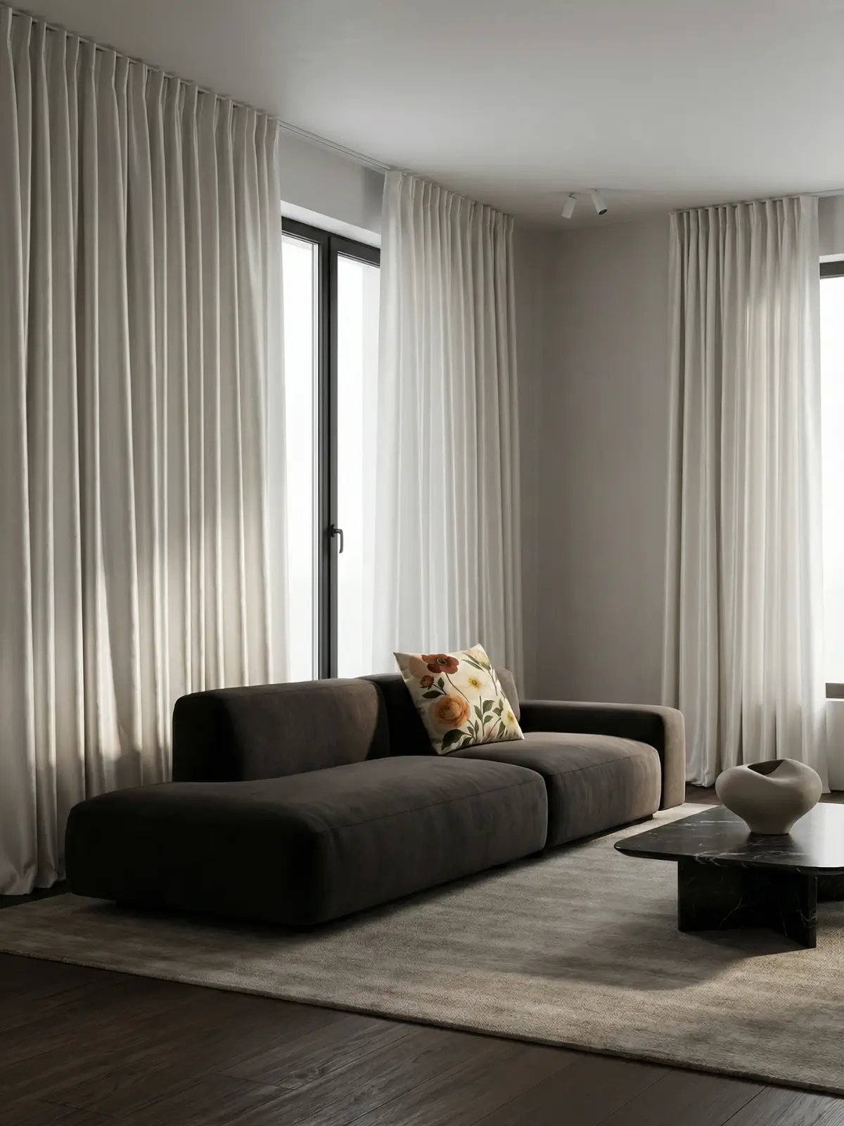 Modern luxury living room with white satin-linen curtains and a sculptural sofa featuring the Ranunculus Anemone Protea Vintage Pillow