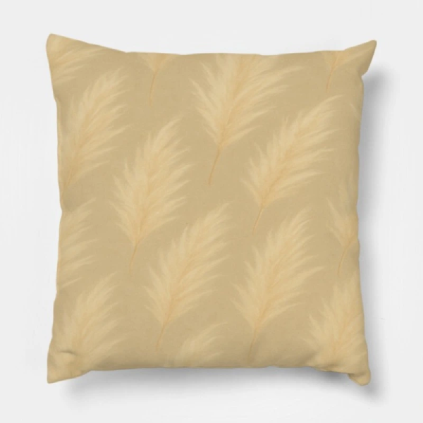 Boho Pampas Grass Pillow on a woven rattan armchair